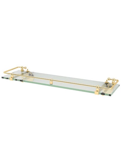 Premier Glass Bathroom Shelf with Railing in Polished Brass.
